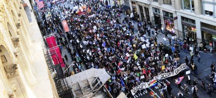 Occupy Wall Street participants stage a march down Broadway as part of May Day celebrations in New York, 05/01/12. (photo: Getty Images)